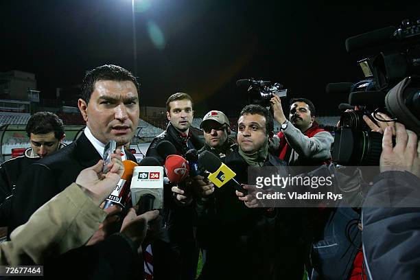 Coach Mircea Rednic of Dinamo gives interviews after winning with his team 2:1 the UEFA Cup Group B match between Dinamo Bucharest and Bayer...