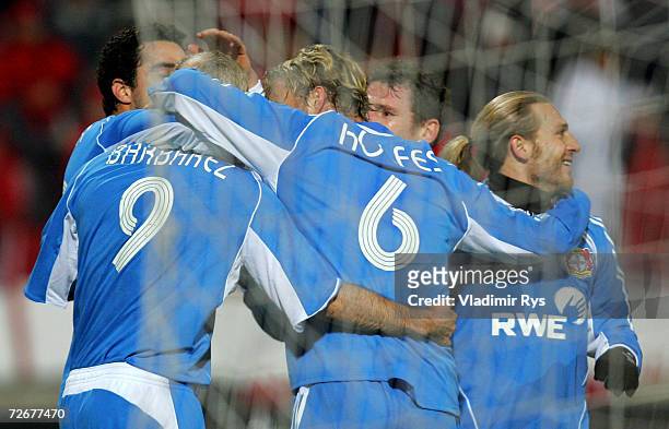 Sergej Barbarez is celebrated by his team mates after scoring the first goal during the UEFA Cup Group B match between Dinamo Bucharest and Bayer...