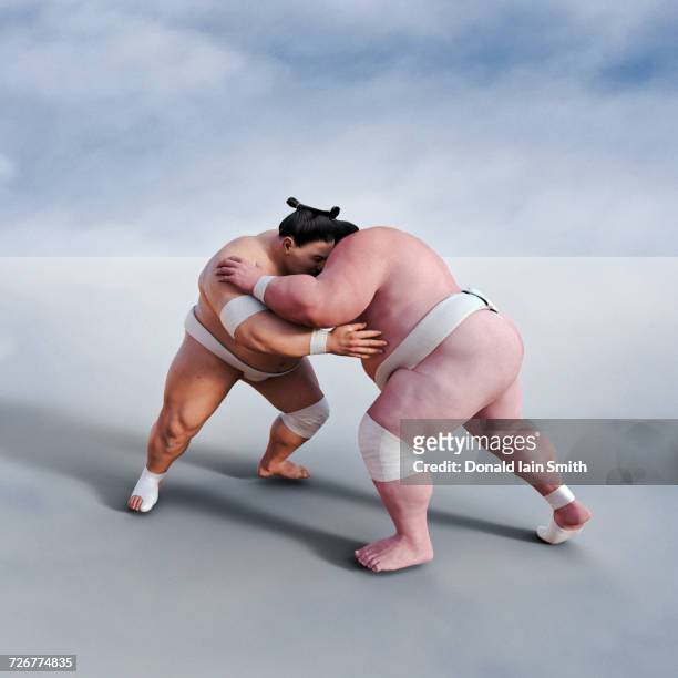sumo wrestlers wresting - sumô - fotografias e filmes do acervo