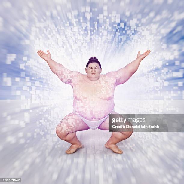 energy flowing from sumo wrestler - sumo stock-fotos und bilder