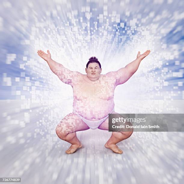 energy flowing from sumo wrestler - sumo wrestling stock pictures, royalty-free photos & images