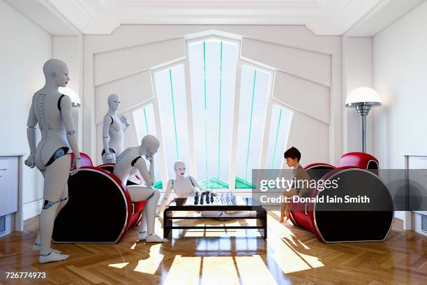 robots playing chess against girl - art deco home stock pictures, royalty-free photos & images