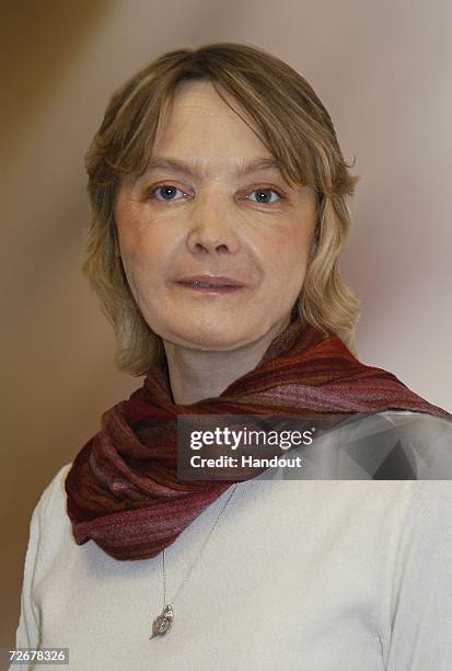 In this handout image supplied by CHU Amiens, Isabelle Dinoire poses for a portrait on November 21, 2006 in Amiens, France. The portrait was taken...