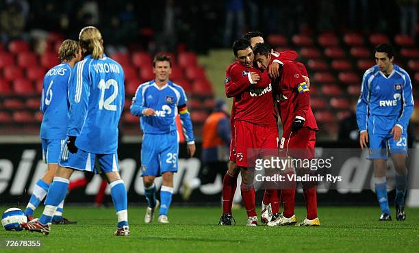 Claudiu Niculescu of Dinamo is celebrated by his team mates after scoring during the UEFA Cup Group B match between Dinamo Bucharest and Bayer...