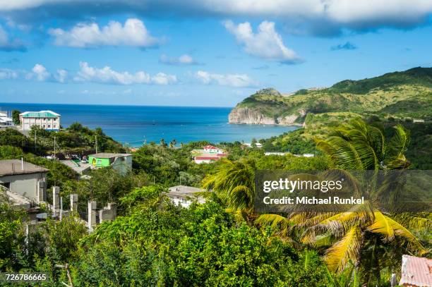 view over little bay, montserrat, british overseas territory, west indies, caribbean, central america - monserrat mountain stock pictures, royalty-free photos & images