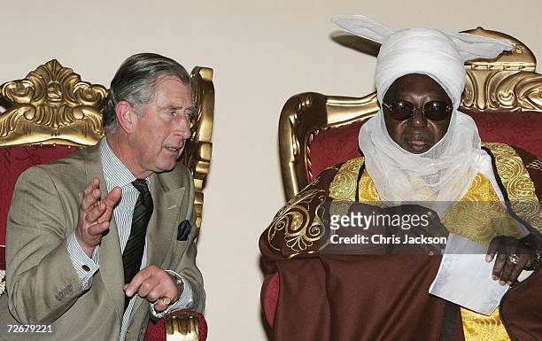 Prince Charles, The Prince of Wales chats with the Emir of Zazzau at the Emir's Palace on November 30, 2006 near Kano, Nigeria. This is the final day...
