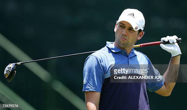 Sun City, SOUTH AFRICA: Sergio Garcia of Spain reacts after playing a shot on the 18th hole on day one of Nedbank Golf Challenge first round in Sun...