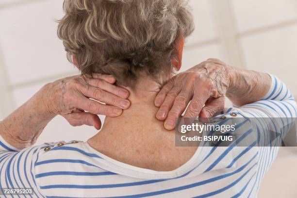 senior with cervicalgia - cervical spondylosis stock pictures, royalty-free photos & images