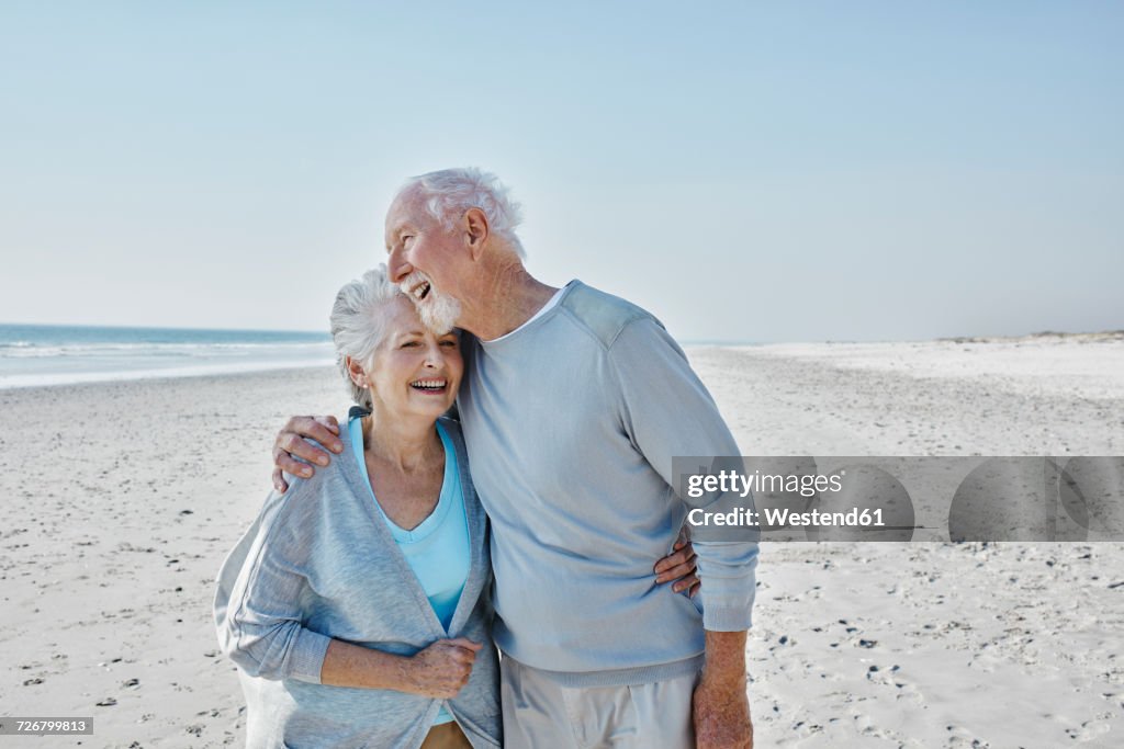Happy senior couple on the beach