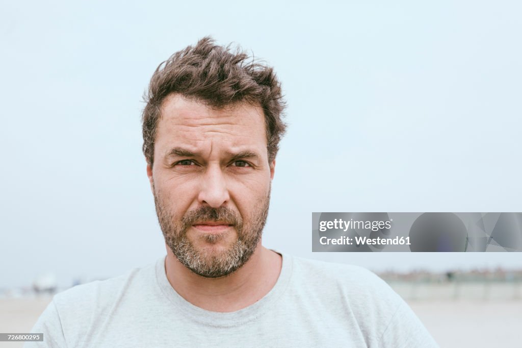 Portrait of bearded man on the beach