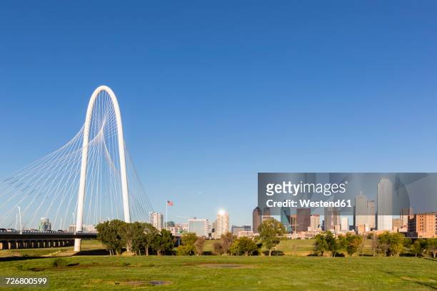 usa, texas, dallas, margaret hunt hill bridge and skyline - dallas margaret hunt hill bridge stock pictures, royalty-free photos & images