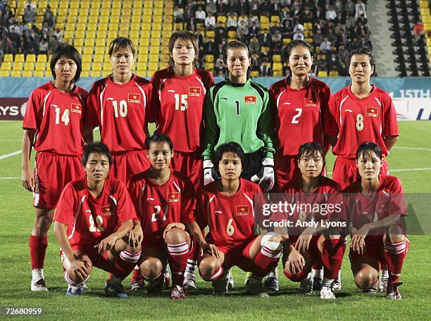 The Vietnam team pose for a photograph before the Women's Preliminary Round Group B match between the Democratic People's Republic of Korea and...