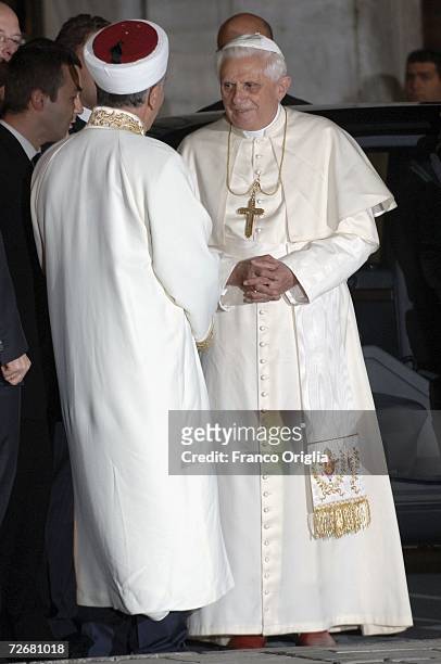 Pope Benedict XVI talks with Mustafa Cagrici, Mufti of Istanbul , as he arrives at the Blue Mosque on November 30, 2006 in Istanbul, Turkey. The Pope...