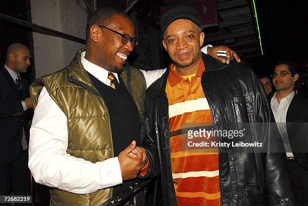 Music industry mobile Andre Hurrell and DJ Red Alert pose at Rev Run's birthday celebration at Tenjune on November 29, 2006 in New York City.
