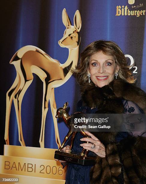 Veronique Peck, widow of late actor Gregory Peck, holds the Bambi Award that is to replace the one won by Mr. Peck many years ago but lost, at the...