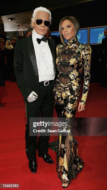 Designer Karl Lagerfeld and Victoria Beckham attend the 58th annual Bambi Awards at the Mercedes-Benz Museum on November 30, 2006 in Stuttgart,...