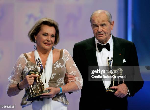 Actors Walter Giller and Nadja Tiller accept their lifetime achievement award at the 58th annual Bambi Awards at the Mercedes-Benz Museum on November...