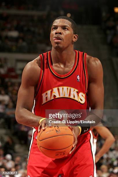 Joe Johnson of the Atlanta Hawks shoots a free throw against the Detroit Pistons on November 22, 2006 at the Palace of Auburn Hills, in Auburn Hills,...