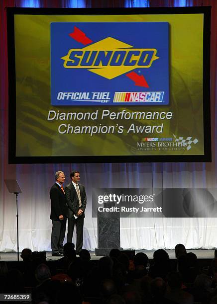 The 2006 NASCAR Nextel Cup Series Champion Jimmie Johnson, receives Sunoco Diamond Performance Champion's Award, during the NASCAR NMPA Myers...