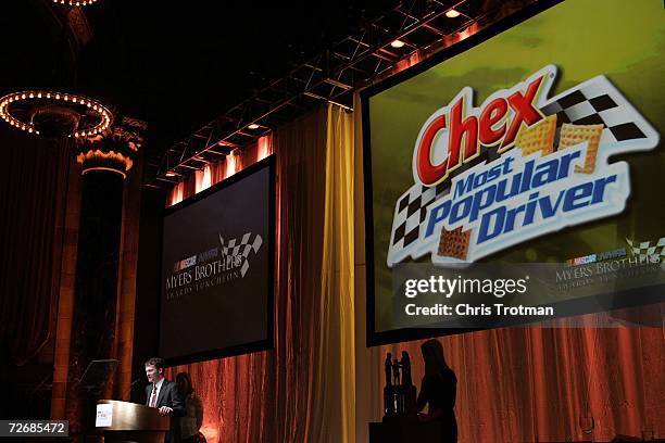 Driver Dale Earnhardt Jr., receives Chex Most Popular Driver Award, during the NASCAR NMPA Myers Brothers Award Luncheon, at Ciprani, on November 30,...