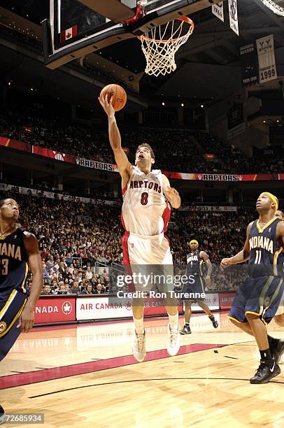 Jose Calderon of the Toronto Raptors shoots a layup against the Indiana Pacers on November 26, 2006 at the Air Canada Centre in Toronto, Canada. The...