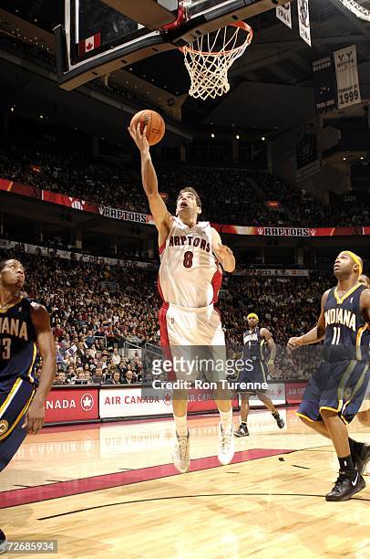 Jose Calderon of the Toronto Raptors shoots a layup against the Indiana Pacers on November 26, 2006 at the Air Canada Centre in Toronto, Canada. The...