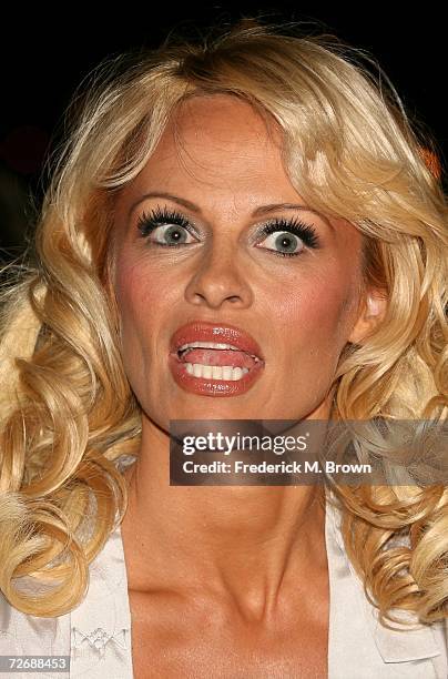 Actress Pamela Anderson arrives at the Inagural "Arby's Action Sports Awards" held at Center Staging on November 30, 2006 in Burbank, California.