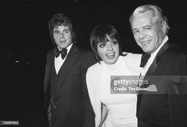 American entertainer Liza Minelli attends an unidentified formal event with date American actor Desi Arnaz Jr. And his father, Cuban-born American...