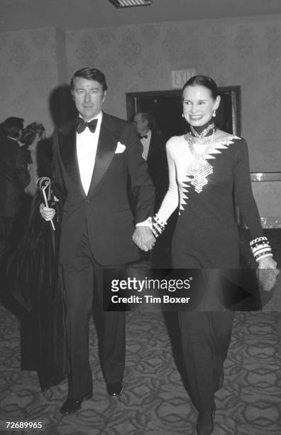 American heriess and designer Gloria Vanderbilt and her fourth husband, actor and editor Wyatt Cooper , arrive at the premiere of the film 'Cabaret'...
