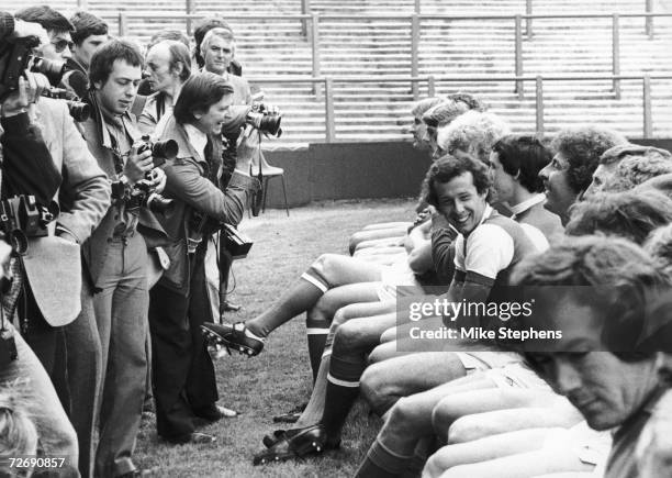 Liam Brady joking with his team mates during an Arsenal photo call with the press at their stadium in Highbury, 17th July 1980. Goalkeeper Pat...