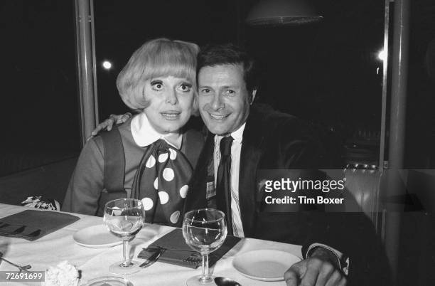 American actress Carol Channing poses with Broadway composer and lyricist Jerry Herman, November 1979. Herman created the production 'Hello Dolly'...