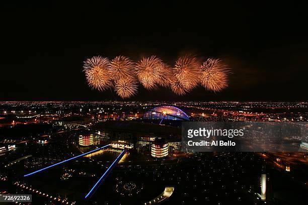 Fireworks explode over Khalifa Stadium after the lighting of the torch during the Opening Ceremony at the 15th Asian Games on December 1, 2006 in...