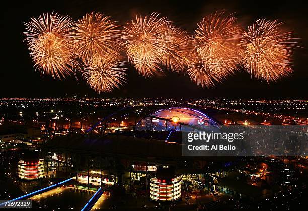 Fireworks explode over Khalifa Stadium after the lighting of the torch during the Opening Ceremony at the 15th Asian Games on December 1, 2006 in...