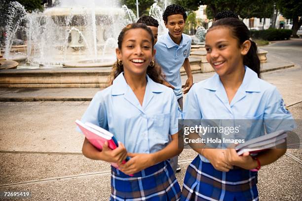 school children socializing in center plaza - puerto rico dance stock pictures, royalty-free photos & images