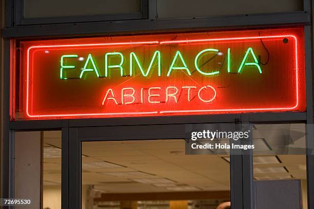 pharmacy open sign, spanish - farmacia stock-fotos und bilder