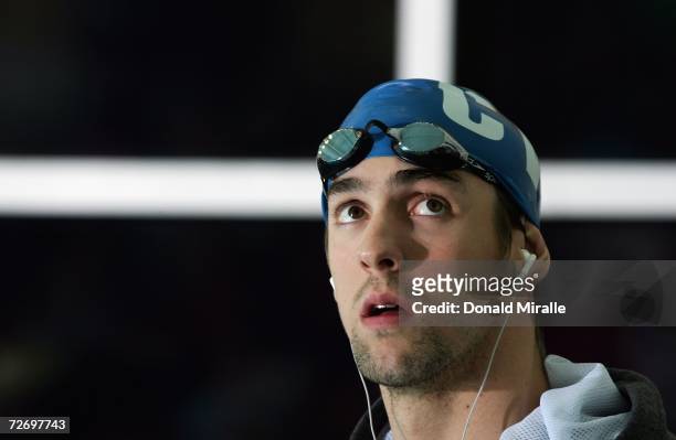 World-Record Holder and Olympic Champion Michael Phelps looks on before the start of the Men's 400M Individual Medley Final during the 2006 U.S. Open...
