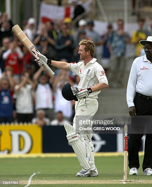 England batsman Paul Collingwood points his bat towards spectators after scoring a century on day two of the second Ashes cricket Test against...