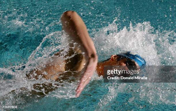 World-Record Holder and Olympic Champion Michael Phelps swims en route to winning the Men's 200M Freestyle Final during the 2006 U.S. Open of...