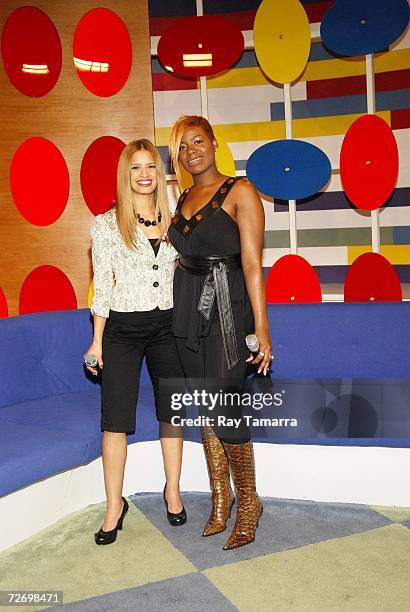 On-air personality Rocsi and recording artist Fantasia Barrino appear at BET's "106 & Park" broadcast at CBS Studios on December 01, 2006 in New York...
