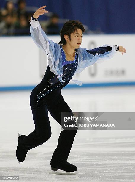 Japanaese skater Daisuke Takahashi performs during the short program of men's event in the NHK Trophy Figure Skating competition in Nagano, central...