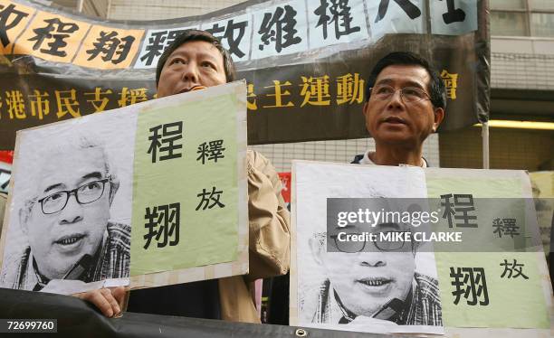 Group of protestors from various pro democracy organisations hold banners with pictures of detained Hong Kong journalist Ching Cheong march towards...