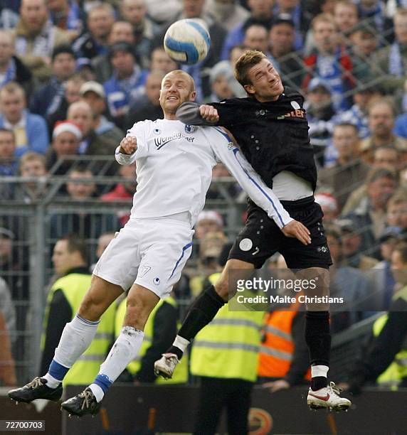 Michael Habryka of Magdeburg competes with Marvin Braun of Pauli during the Third League match between FC St.Pauli and 1.FC Magdeburg at the...