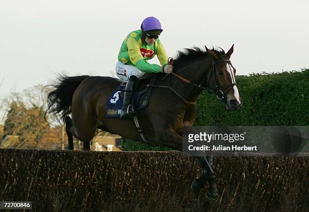 Ruby Walsh and Kauto Star clear the second fence before landing The Tingle Creek Steeple Chase Race run at Sandown Park Racecourse on December 2,...