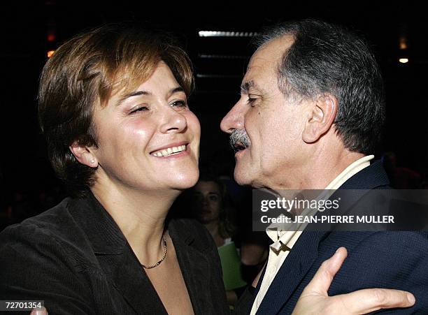 French Green Party presidential candidate Dominique Voynet salutes French MP Noel Mamere during a meeting, 02 December 2006 in Bordeaux,...