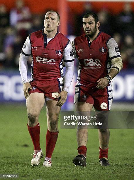 Mike Tindall, Captain of Gloucester gestures after a tackle as he walks with his team mate Patrice Collazo during the EDF Energy Cup game between...