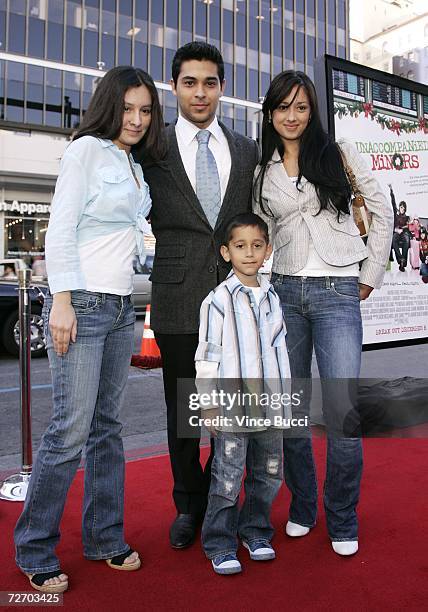 Actor Wilmer Valderrama poses with his siblings Stephanie Valderrama, Christian Valderrama and Marilyn Valderrama at the premiere of the Warner Bros....