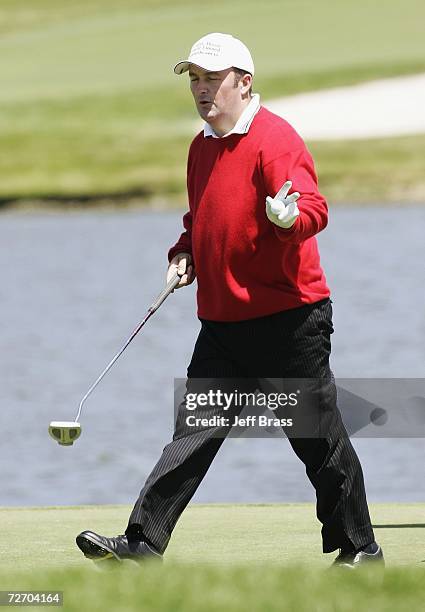 Damien McGrane of Ireland acknowleges the crowd at the 7th hole during the final round of the New Zealand Open at Gulf Harbour Country Club on the...