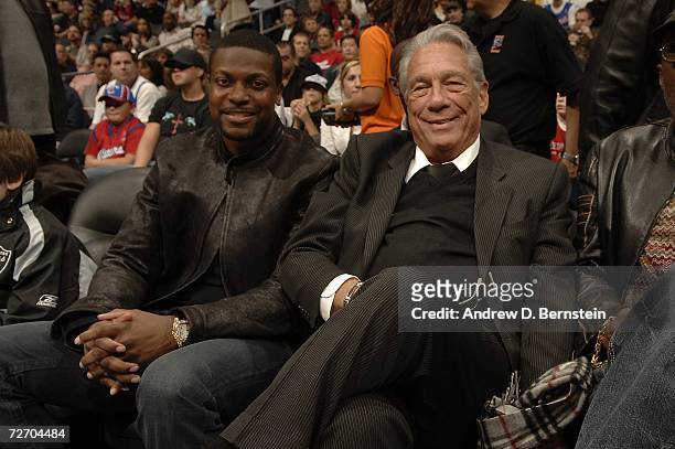 Chris Tucker sits courtside with Clippers owner Donald Sterling before the game between the Los Angeles Clippers and the Los Angeles Lakers on...