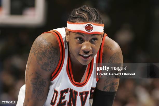 Carmelo Anthony of the Denver Nuggets looks up during the game against the Indiana Pacers at the Pepsi Center December 2, 2006 in Denver, Colorado....