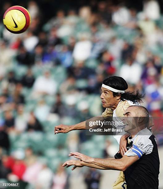 Milton Rodriguez of the Newcastle Jets and Neil Emblen of the Knights clash during the round 15 Hyundai A-League match between the New Zealand...